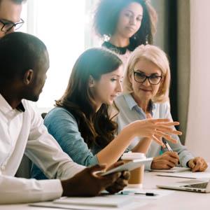 Diverse staff in office meeting