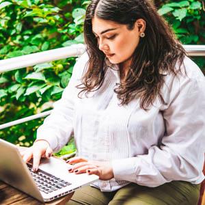 Woman working on laptop computer