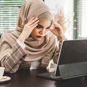 Upset woman reviewing information