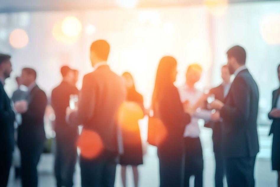 Blurry photo of professionals networking