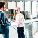 Staff talking in hallway